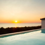 Solnedgang over pool på Toscana Charme Resort